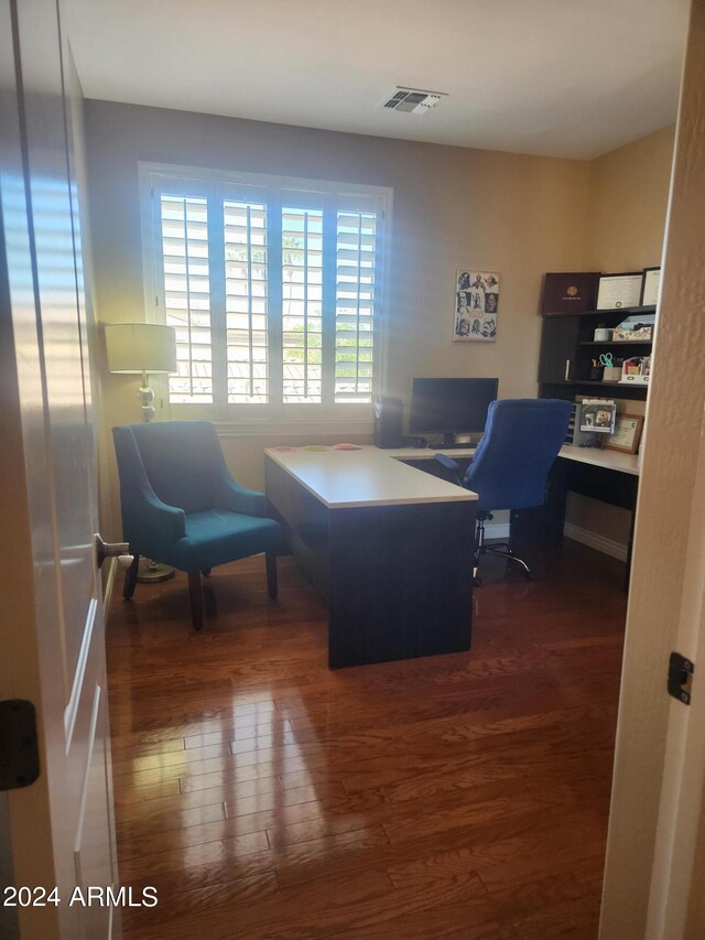 home office featuring dark hardwood / wood-style flooring