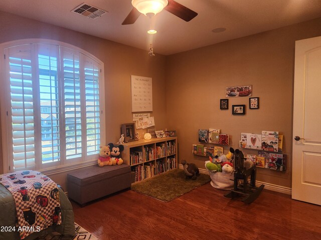 interior space featuring ceiling fan and wood-type flooring