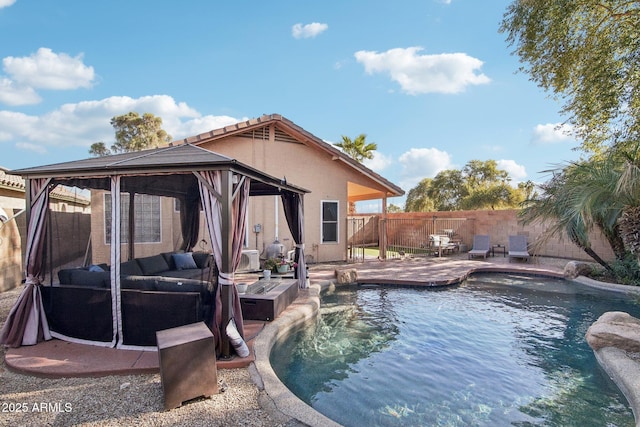 view of pool with a gazebo and pool water feature