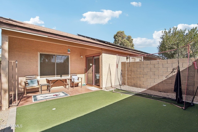 back of house featuring a patio area