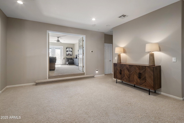sitting room with visible vents, a ceiling fan, recessed lighting, carpet flooring, and baseboards
