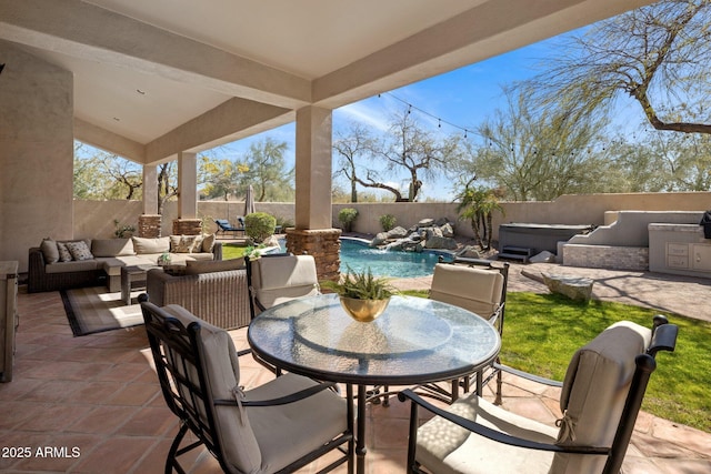 view of patio / terrace with outdoor dining area, a fenced backyard, a fenced in pool, and an outdoor hangout area
