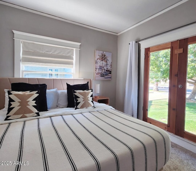 bedroom with ornamental molding, french doors, carpet, and access to outside