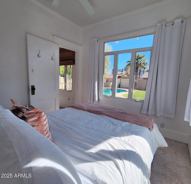 bedroom featuring a ceiling fan and carpet floors