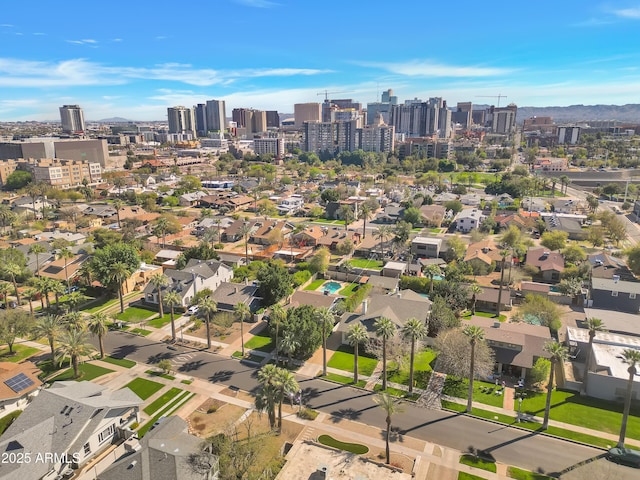 birds eye view of property with a city view