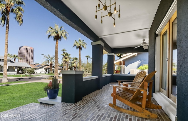 view of patio featuring a porch and ceiling fan