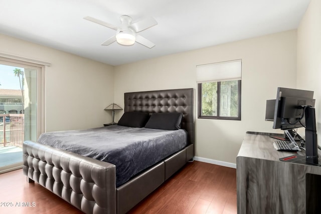 bedroom featuring access to outside, dark wood-type flooring, a ceiling fan, and baseboards