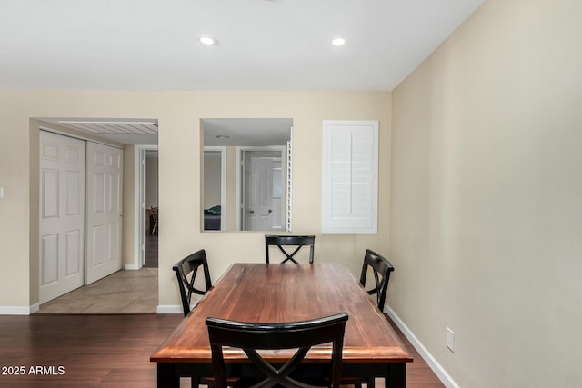 dining room featuring recessed lighting, baseboards, and wood finished floors