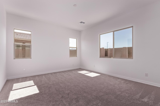 20274 W Monterey Way, Buckeye, AZ 85396 - carpeted spare room featuring baseboards