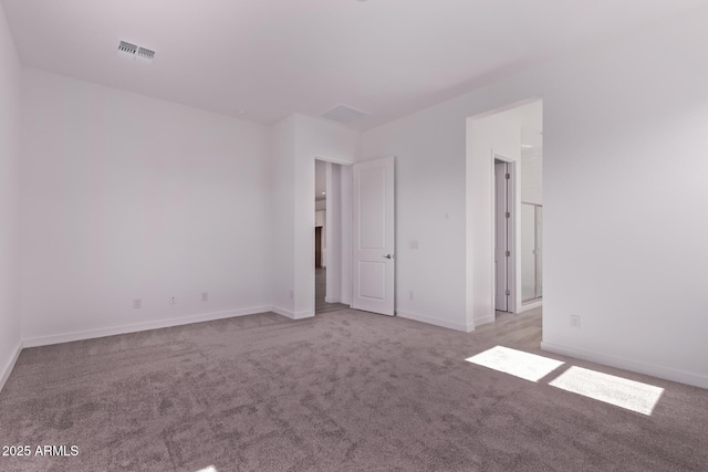 20274 W Monterey Way, Buckeye, AZ 85396 - empty room featuring carpet flooring and baseboards