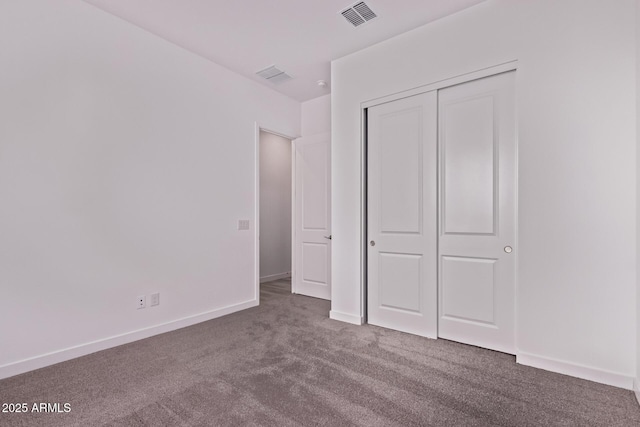 20274 W Monterey Way, Buckeye, AZ 85396 - unfurnished bedroom with carpet flooring and a closet