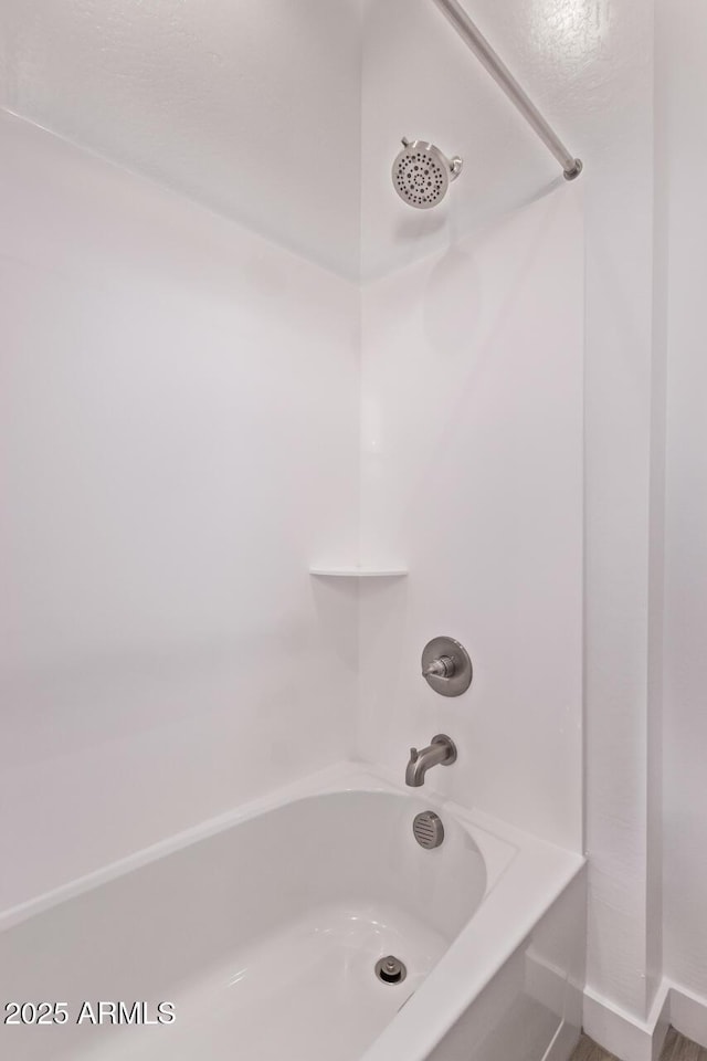 20274 W Monterey Way, Buckeye, AZ 85396 - bathroom featuring shower / tub combination
