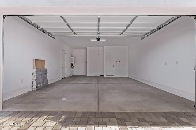 20274 W Monterey Way, Buckeye, AZ 85396 - garage with baseboards and water heater