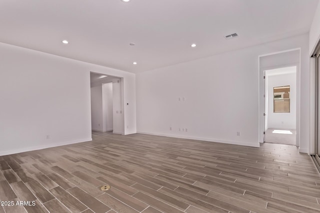 20274 W Monterey Way, Buckeye, AZ 85396 - unfurnished room featuring wood finished floors and recessed lighting