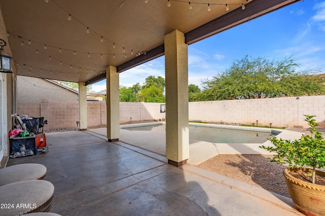 view of patio / terrace with an empty pool