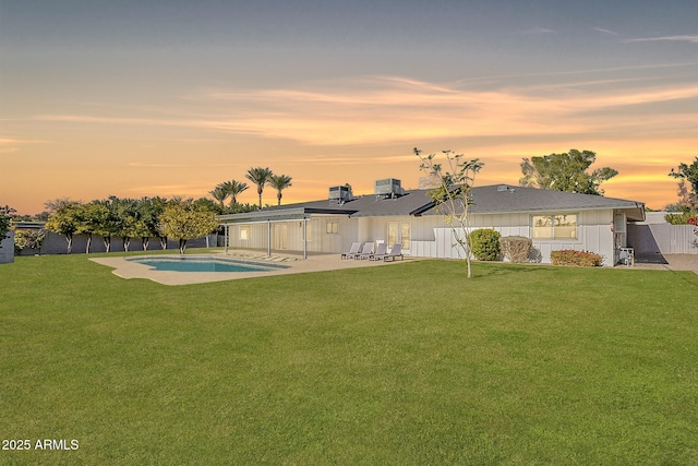 1911 E Claremont St, Phoenix, AZ 85016 - exterior space featuring a fenced in pool, fence, and a patio