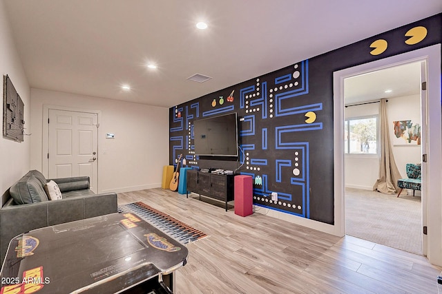 1911 E Claremont St, Phoenix, AZ 85016 - living area with recessed lighting, baseboards, visible vents, and wood finished floors