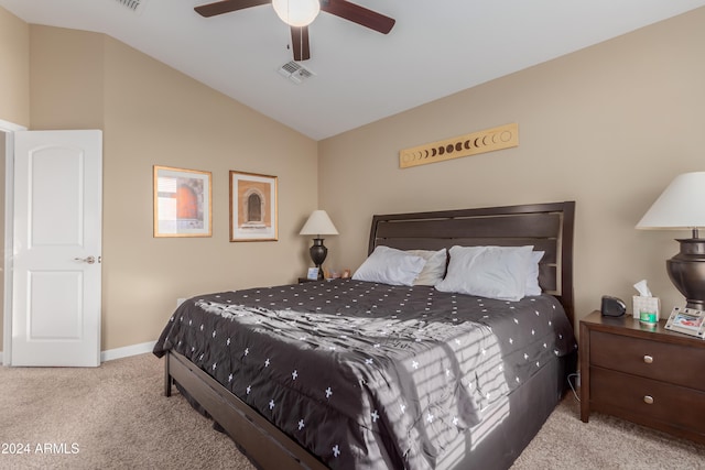 bedroom featuring lofted ceiling, light carpet, and ceiling fan