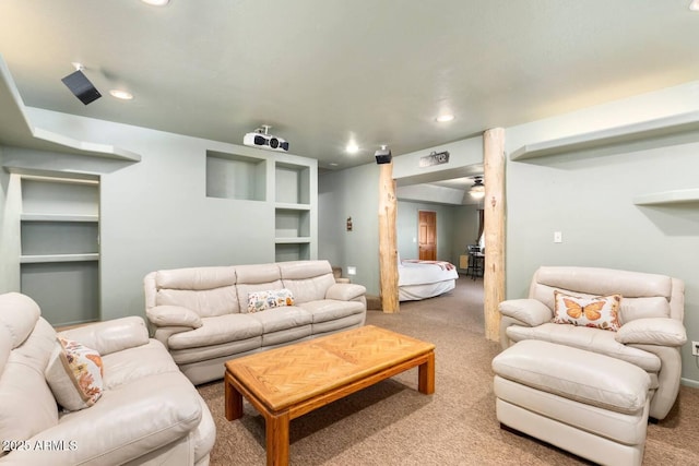 carpeted living room with recessed lighting and built in features