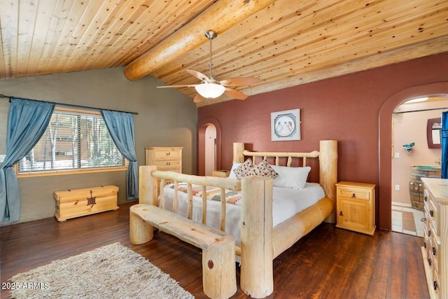 bedroom with lofted ceiling with beams, arched walkways, dark wood-style flooring, and wooden ceiling