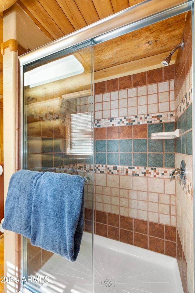 bathroom with a stall shower