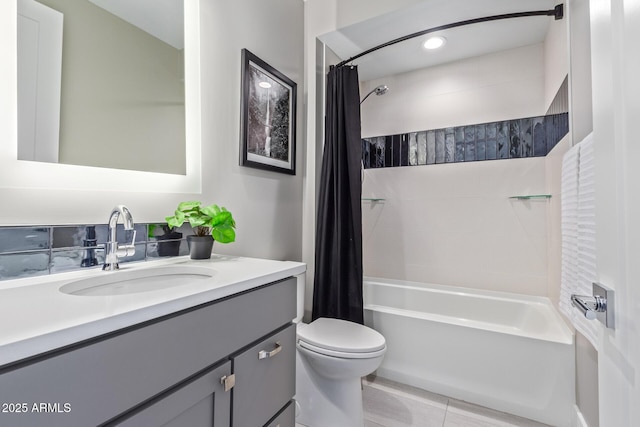 full bathroom featuring vanity, toilet, and shower / bath combo