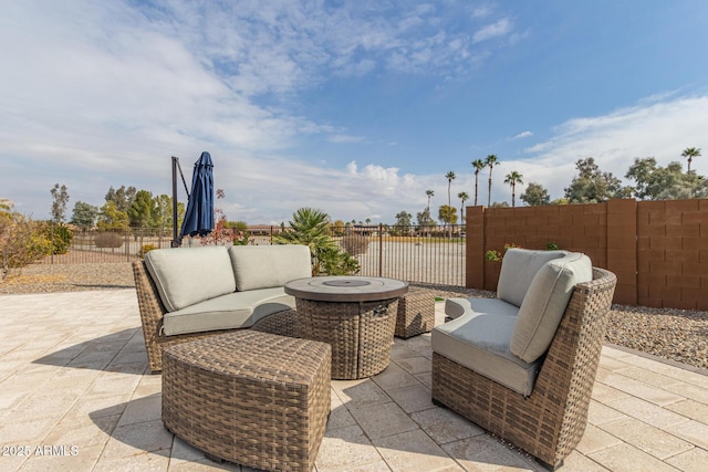 view of patio / terrace with an outdoor fire pit