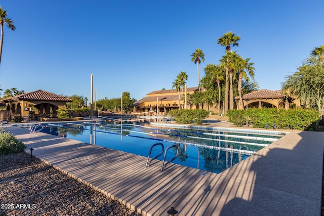 view of swimming pool with a gazebo