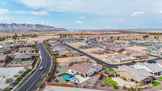 drone / aerial view featuring a mountain view