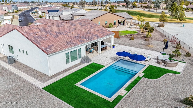 view of pool featuring central AC and a patio area