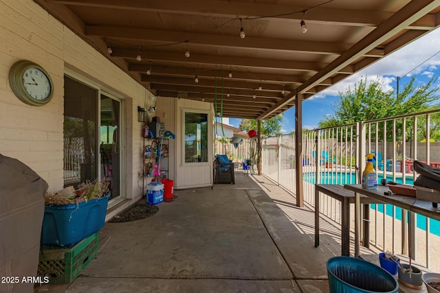view of patio with a fenced backyard and a fenced in pool