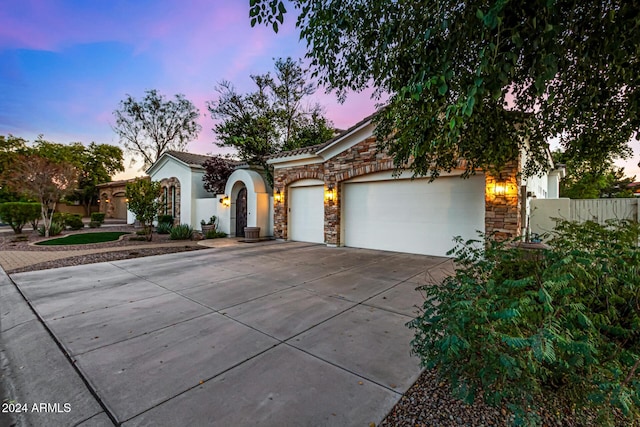 view of front of house with a garage