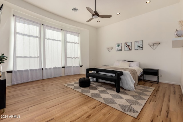 bedroom featuring ceiling fan and light wood-type flooring