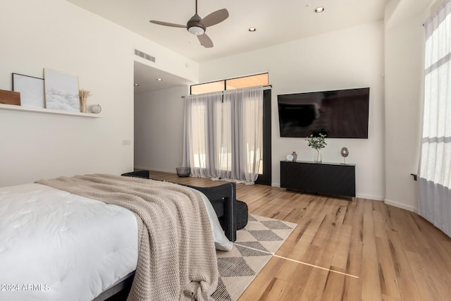 bedroom featuring ceiling fan and hardwood / wood-style floors