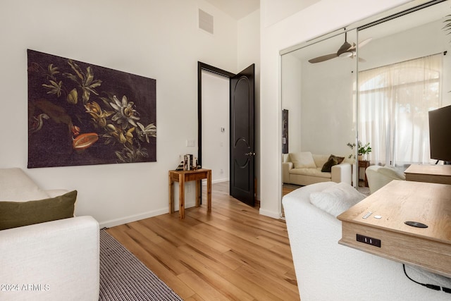 interior space featuring ceiling fan and light hardwood / wood-style floors