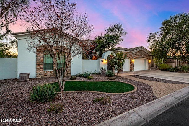 view of front of home featuring a garage