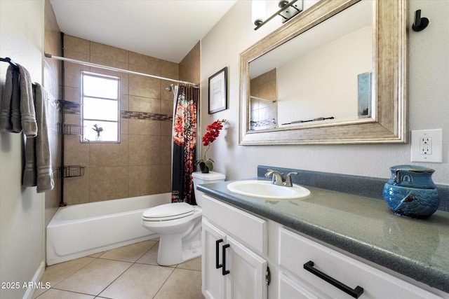 full bathroom with tile patterned flooring, shower / bath combo with shower curtain, vanity, and toilet