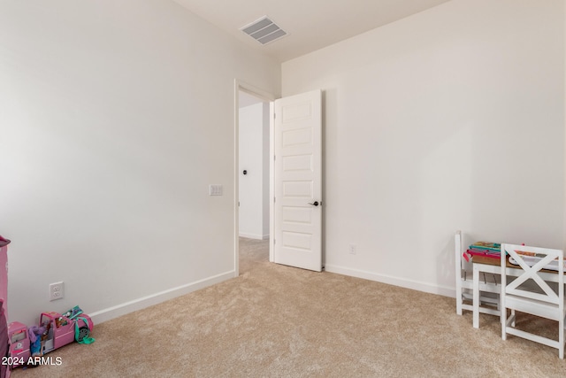 playroom featuring light carpet