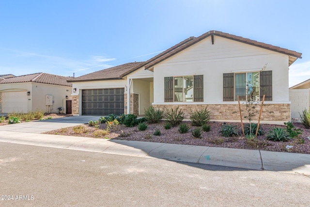 view of front of home with a garage