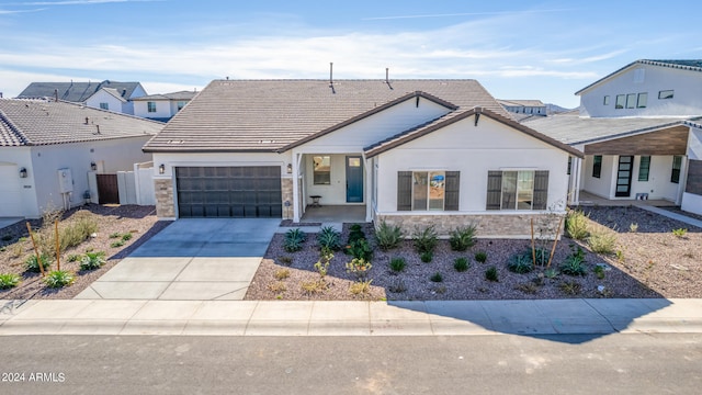 view of front of property with a garage