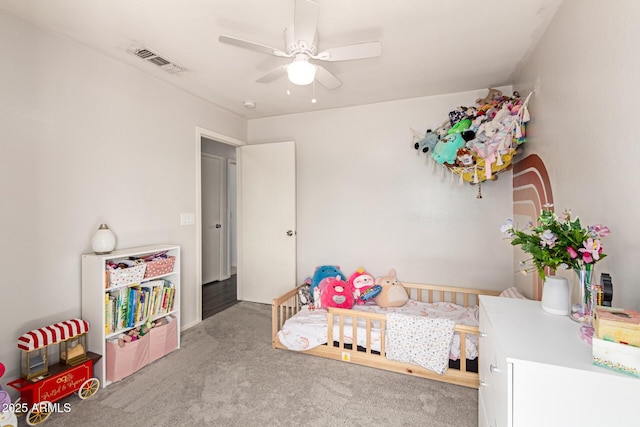 bedroom featuring a ceiling fan, carpet, and visible vents