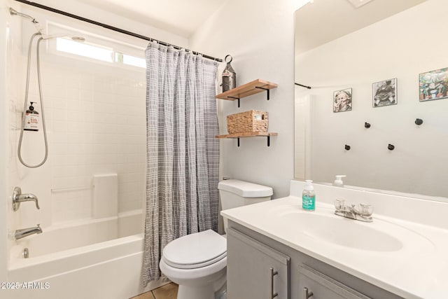 full bathroom featuring tile patterned floors, vanity, toilet, and shower / bath combo with shower curtain