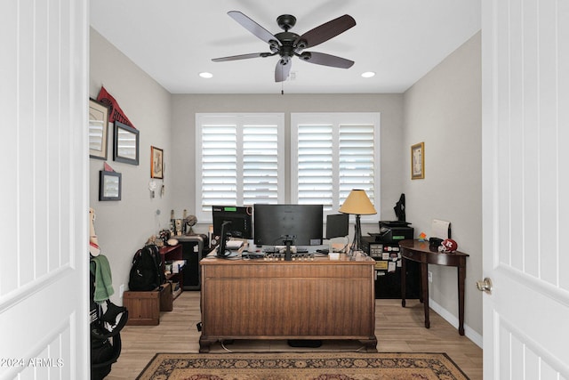 office space with ceiling fan and light hardwood / wood-style floors