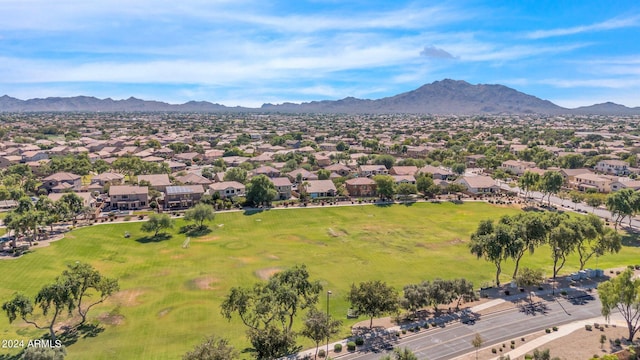 birds eye view of property featuring a mountain view