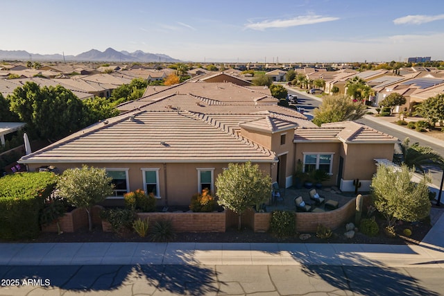 aerial view featuring a residential view and a mountain view