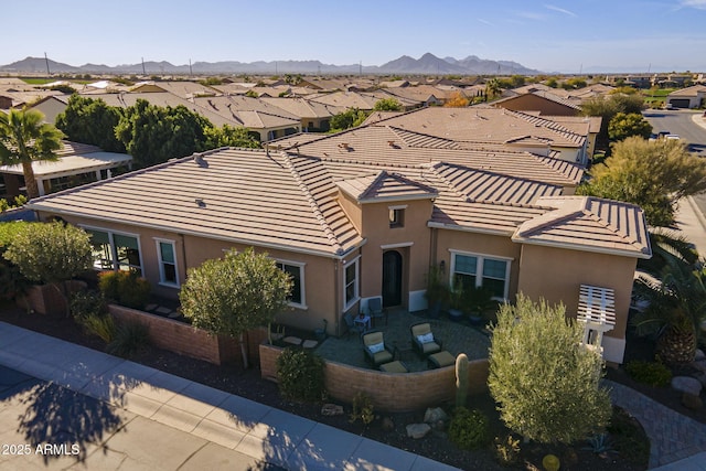 birds eye view of property featuring a residential view and a mountain view