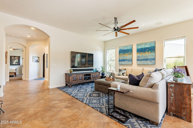 living room with ceiling fan