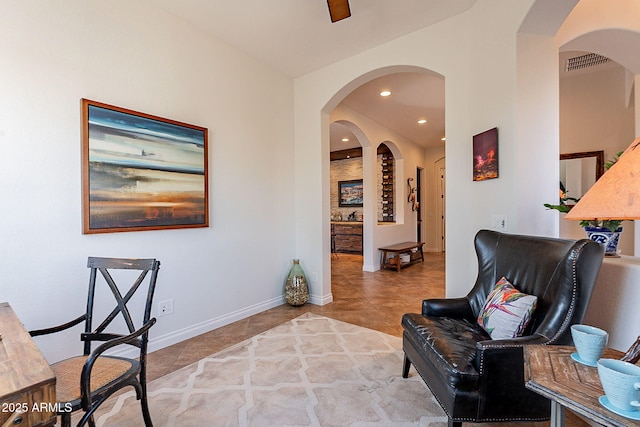 living area with tile patterned flooring