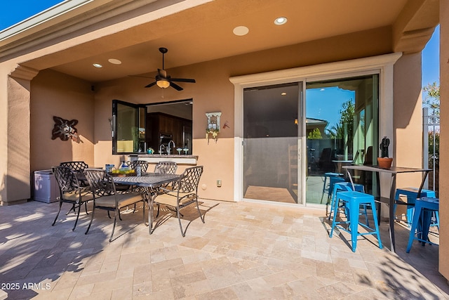 view of patio / terrace with ceiling fan