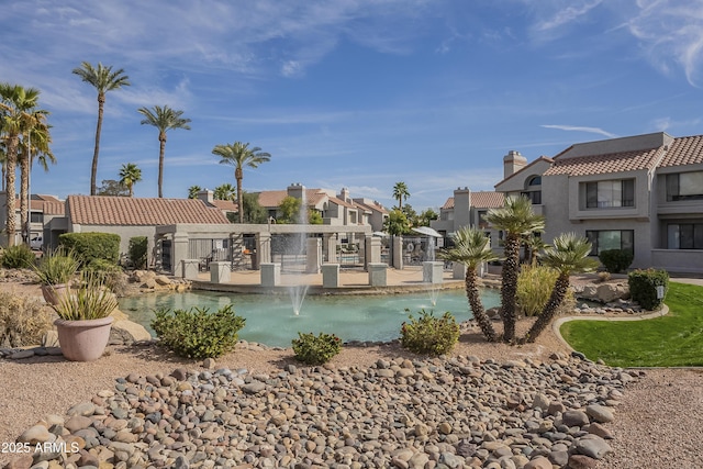 view of pool with a residential view